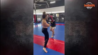 Tracy Cortez hitting the pads working her Muay Thai