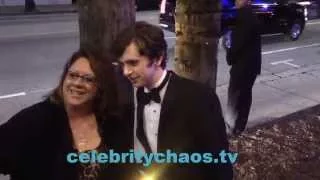 Bates Motel Freddie Highmore helps Vera Farmiga to car then thrills lucky fans