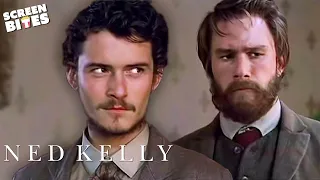 Ned Kelly: Ned (Heath Ledger) and Joseph (Orlando Bloom) carry out a robbery