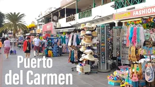 Puerto del Carmen main strip walk Lanzarote, beach front from Matagorda end shops restaurants