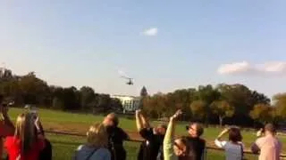 Obama arrives by helicopter