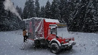 CARAVAN CAMPING WITH STOVE IN HEAVY SNOWFALL