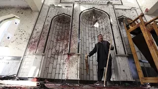 At least 72 dead after suicide bombers attack Afghan mosques