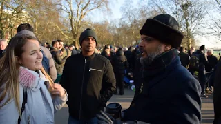 P1 Br Hashim has a discussion with a lady Speakers Corner Hyde Park