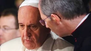 Mons. Marini & Pope Francis exchanging opinions on something