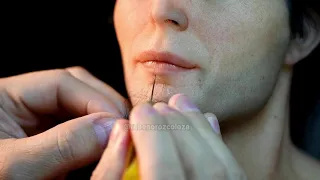 Hair punching - Freddie Mercury sculpture