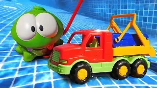 Om Nom on the Beach: Funny Toy Videos for Kids with Toy Cars and Trucks.