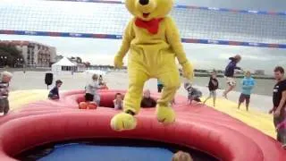 Haribo bear makes backflip on a Bossaball court