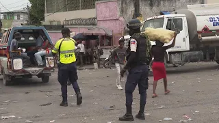 Haitians react to move by UN Security Council to deploy international armed force to country