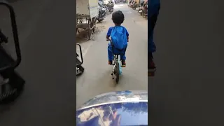 5 year old riding cycle on street #decathlon #cycling #kids #cute #btwin