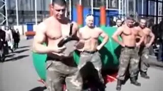 Russian Strongman Folds Pan With Bare Hands