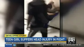 Girl hospitalized after school fight caught on camera