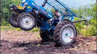 Máy cày ford kéo cây tràm ở chà là