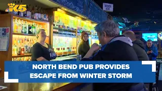 North Bend's Sure Shot Pub provides escape from winter storm, power outages