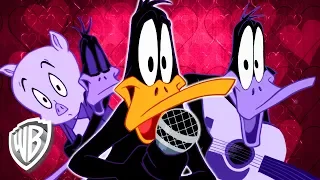 Looney Tunes in italiano | Daffy Duck canta 'Giant Robot Love' | WB Kids