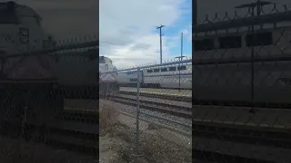Trinity Railway Express Gives Horn Blast Next To Amtrak