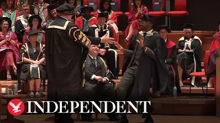 Student breaks into epic celebratory dance at graduation ceremony