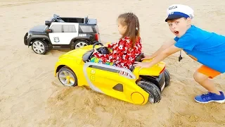 Ali and Adriana Ride on Toy Cars Power wheels STUCK in the SAND