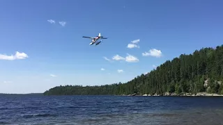 Cessna 185 float plane landing