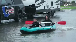 Ventura Residents Kayak and Surf Through Flooded Streets