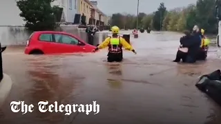 Storm Babet: Car swept away by current in Cork