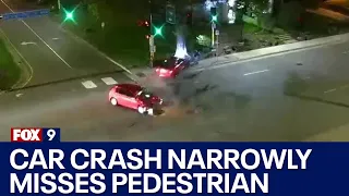 Car narrowly misses pedestrian in Minneapolis