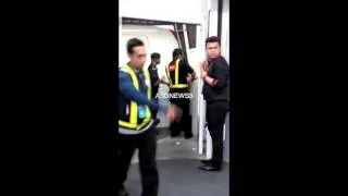 Angry Chinese woman kicks and screams after she missed her AirAsia flight at Kuala Lumpur Airport