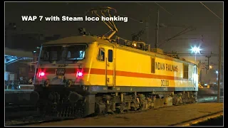WAP 7 with Steam loco honking