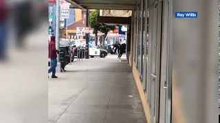 VIDEO: SFPD officer crawls along street after shooting