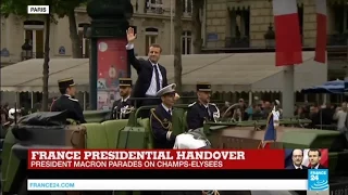 French President Emmanuel Macron parades on Champs-Elysées Avenue