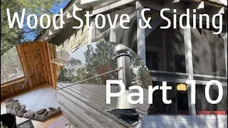 Building an Off-grid Remote Cabin from SCRATCH Part 10: Siding, Wood Stove, and Paint.