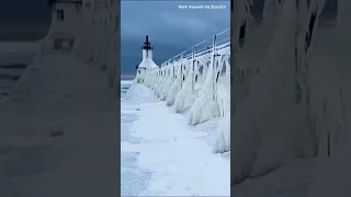 The strong winter storm over Christmas weekend covered a lighthouse at St. Joseph North Pier in ice!