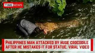 Philippines man attacked by huge crocodile at an amusement park in the Philippines | 12-foot-long