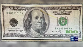 Police warn of people scrubbing $1 bills, turning them into $100