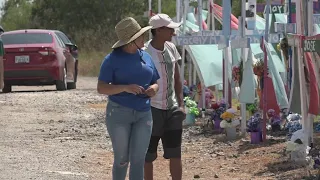 Vigil held to remember 53 migrants who died after being left in a trailer last year