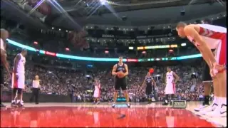 Referee Tries to Block Kris Humphries at the Free Throw Line