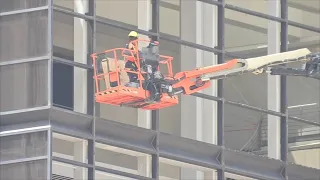 About 4K high-rise building windows shattered in downtown from storms