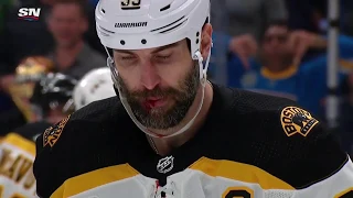 Zdeno Chara takes puck to the face... OUCH...