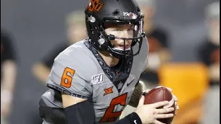 Oklahoma State QB does full flip for the first down!