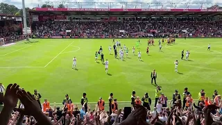 Millwall players thanking traveling fans at Bournemouth.