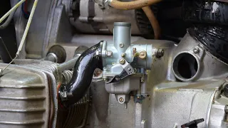 Adapters on the PZ30, aligning them horizontally. I lift the air filter.