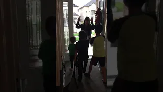 Boys surprised by mom