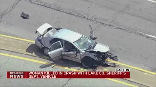 Woman ejected, dies after crash with police car in Gary