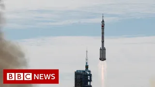 China launches first crew to new space station - BBC News