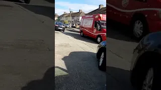 2 ice cream vans on an Irish street