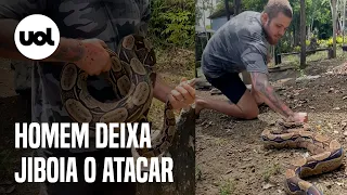 Homem deixa jiboia morder seu braço para mostrar que nada acontece; veja vídeo