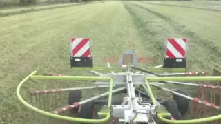 Racking some hay with my 2014 John Deere 6125m and claas liner 450