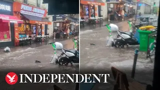 Flash floods hit Paris street after heavy thunderstorm