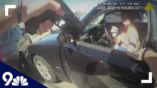 RAW: Bodycam video shows arrest after woman allegedly kicks officer in the face