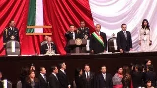 Mexico's Nieto sworn in as president amid protests